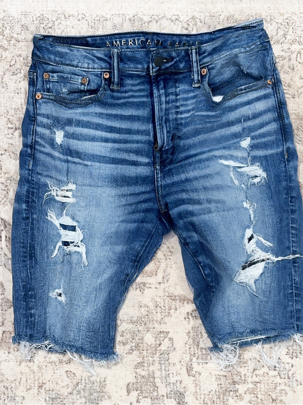 American Eagle Outfitters Ripped Faded Blue Denim Shorts